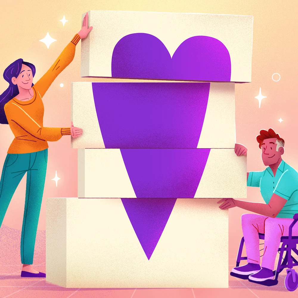 un garçon en fauteuil roulant et une fille debout tiennent des bouts de papier qui forment un coeur