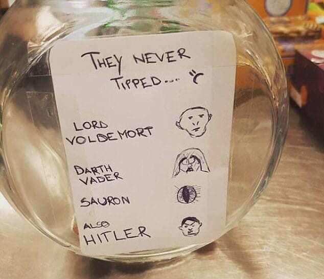 tip jar with faces drawn on it