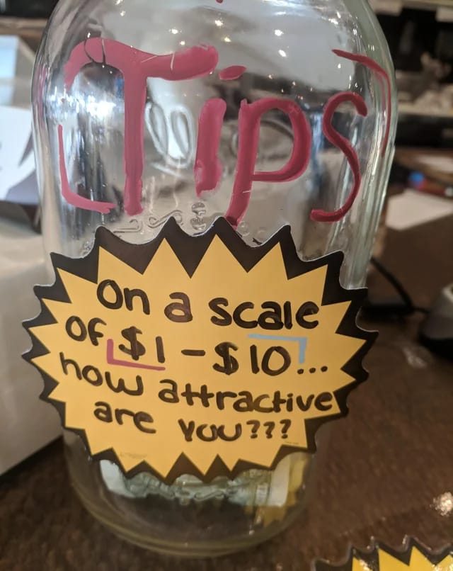 tip jar with yellow paper and text on it