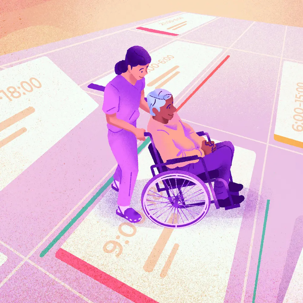 Femme poussant un homme âgé en fauteuil roulant sur un sol fait en horaire de travail